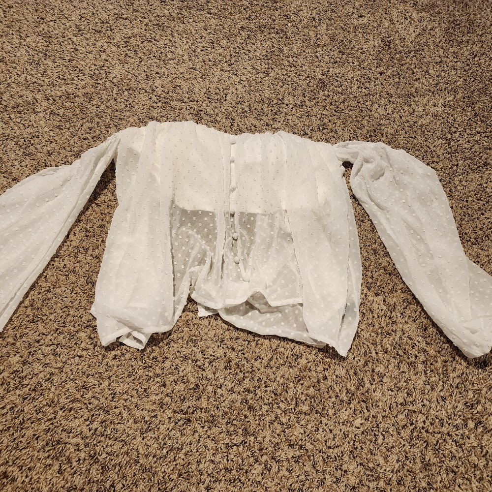 Top white with  sheer outer layer.